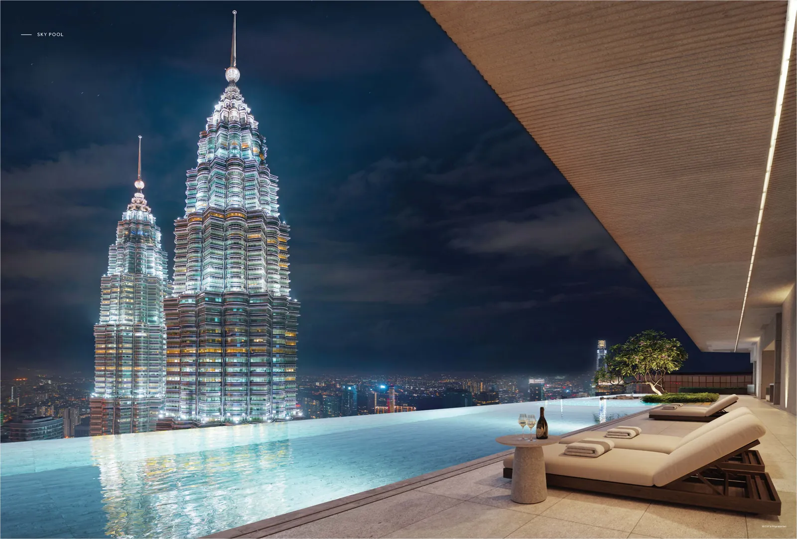 CloutHaus Residences sky pool facing the Petronas Twin Towers at night
